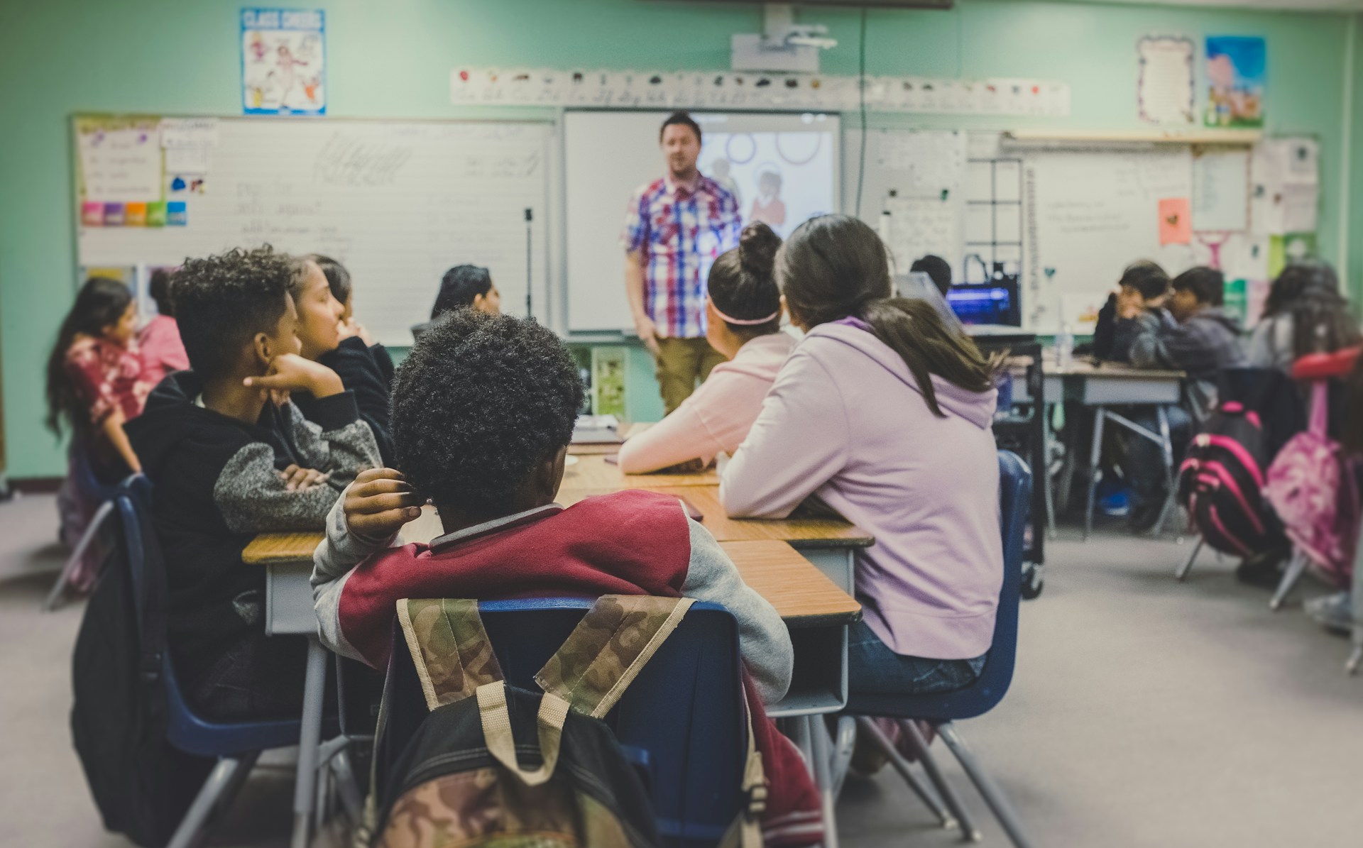 classroom with school children learning