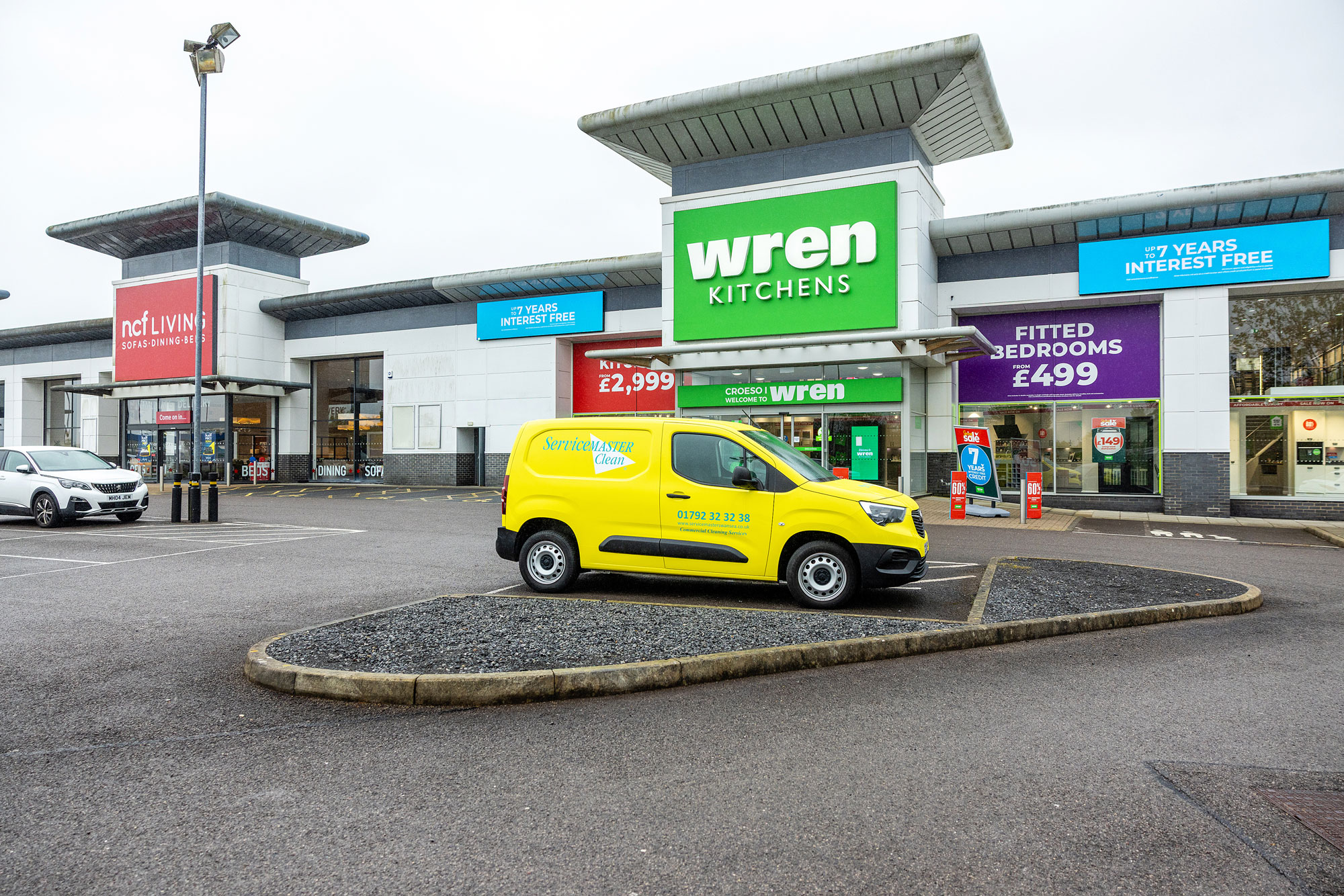 Servicemaster Clean Van outside Wren Kitchens